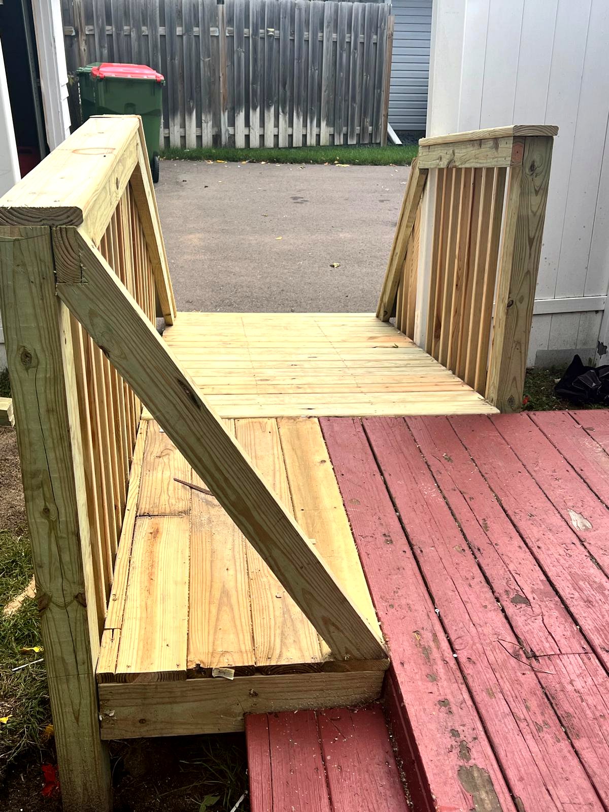 Side view of the accessible ramp with handrails